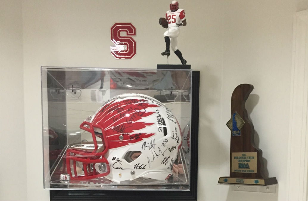 Former Smyrna player Tom Sayers, who runs his family's downtown jewelry store, is a big booster of the team and keeps memorabilia in his home. (Courtesy of Tom Sayers)