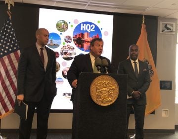 U.S. Sen.  Cory Booker (from left), New Jersey Gov. Chris Christie, and Newark Mayor Ras Baraka say the city would be an ideal location for Amazon’s second headquarters.  (Phil Gregory/WHYY)