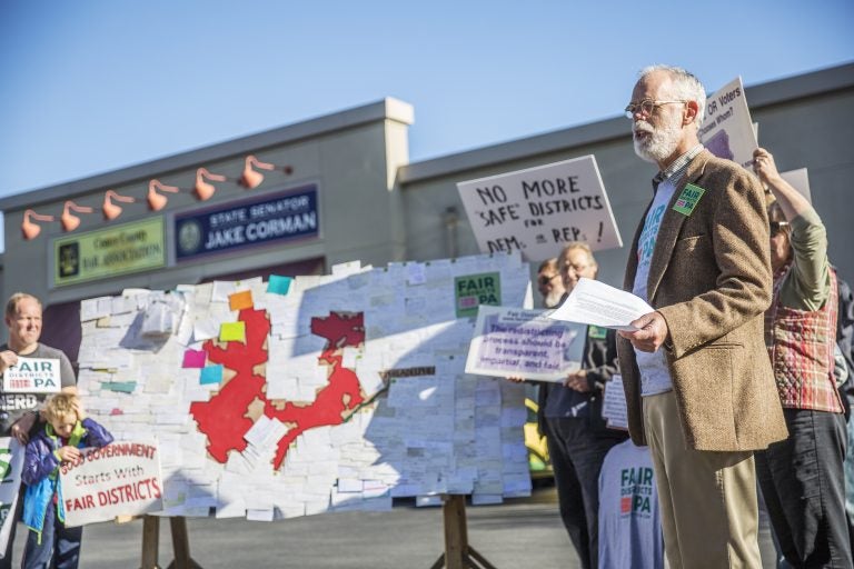 Advocates supporting the lawsuit that eventually overturned the state's congressional map rallied outside Senate Majority Leader Jake Corman's office in Centre County in October 2017.  (Min Xian/Keystone Crossroads) 