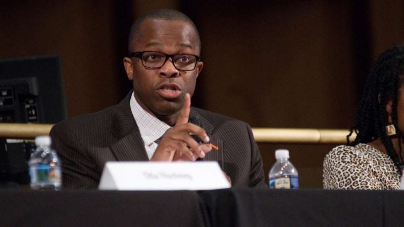 Dr. Wagner Marseille, Superintendent of the Cheltenham School District reacts to a question during Courageous Conversations: Reimagining Race and Education forum at Enon Tabernacle Church, on Thursday night. (Bastiaan Slabbers for WHYY)