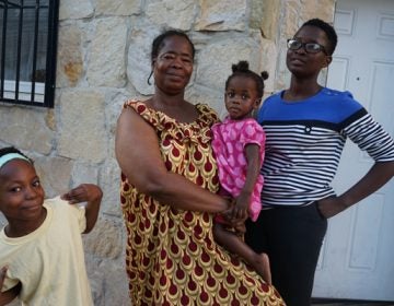 Four of the five Angama women in bright colors