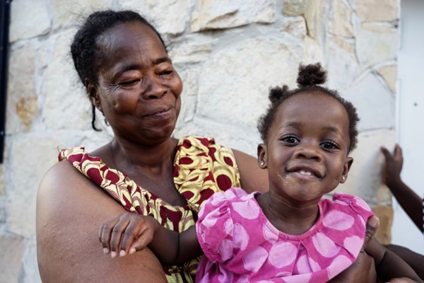 Giselle Angama and Ellary outside their apartment in the 1500 block of Dickinson Street. (Harvey Finkle)