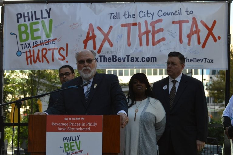 Daniel Grace of Teamsters Local 830 speaks as Jeff Brown looks on from right. (Tom MacDoinald, WHYY)