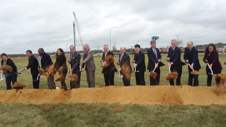 University of Delaware leaders join other dignitaries in the ceremonial groundbreaking for UD's new Biopharmaceutical Innovation Building. (Zoë Read/WHYY) 