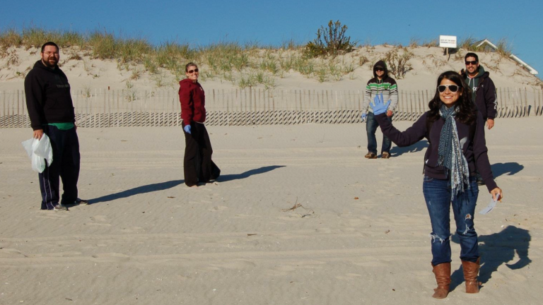 Fall Beach Sweeps volunteers pausing for a photo in Midway Beach in Oct. 2011. (Photo courtesy of Dominick Solazzo)