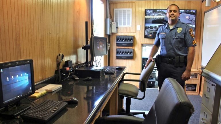 Bridgeton Police Sgt. Jason Hovermann mans a mobile police substation the town will use to target troubled areas and improve community policing (Emma Lee/WHYY)