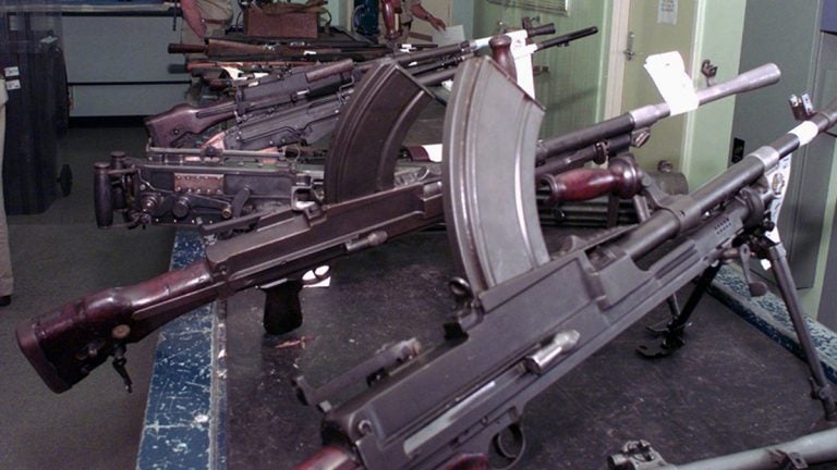 Rifles that have been handed in for refunds are pictured, Tuesday, April 22, 1997, as part of a federal government money-for guns scheme. (Rick Rycroft/AP Photo)
