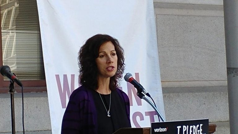 Jeannine Lisitski, executive director of Women Against Abuse, says women are not the only targets of abuse. (Tom MacDonald/WHYY)