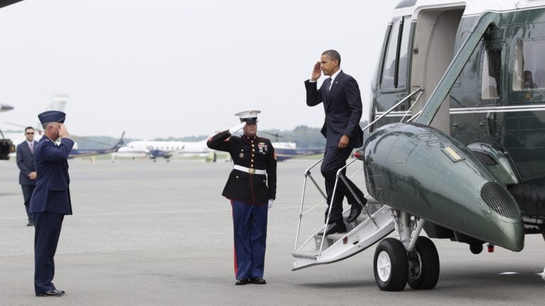 President Barack Obama salutes as he steps off of Marine One, at Dover Air Force Base, Del., Tuesday, Aug. 9, 2011, before meeting privately with families of 30 Americans killed in an International Security Assistance Force helicopter crash in eastern Afghanistan.