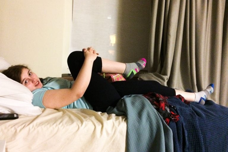 Savannah Fleeman was diagnosed with a form of amplified musculoskeletal pain syndrome. Here she stretches during therapy (Courtesy of the Fleeman family) 