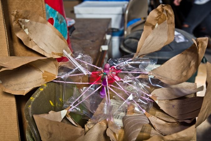 Paper flowers are being made in preparation of the Peoplehood Parade. (Kimberly Paynter/WHYY)