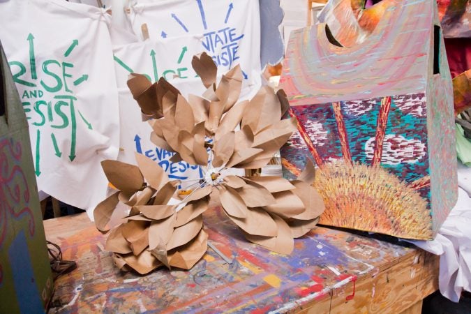 Paper flowers are being made in preparation of the Peoplehood Parade. (Kimberly Paynter/WHYY)