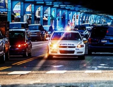 police car under the el kensington