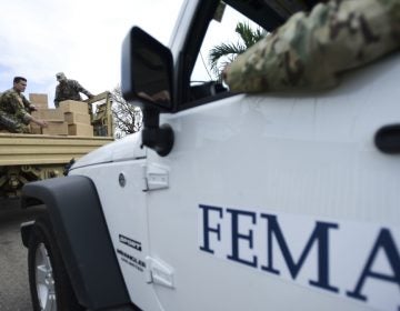 Department of Homeland Security personnel deliver supplies to Santa Ana community residents in the aftermath of Hurricane Maria in Guayama, Puerto Rico.