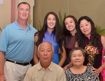 The author is shown with her family.