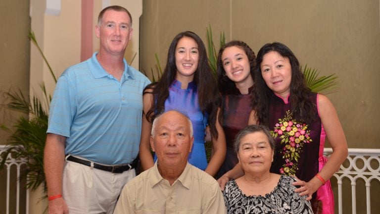 The author is shown with her family.