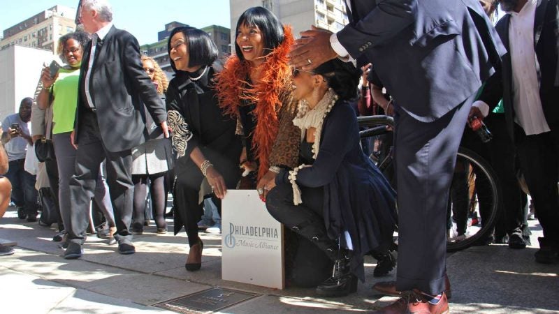 Members of the group LaBelle uncover their plaque at the Philadelphia Music Walk of Fame ceremony.