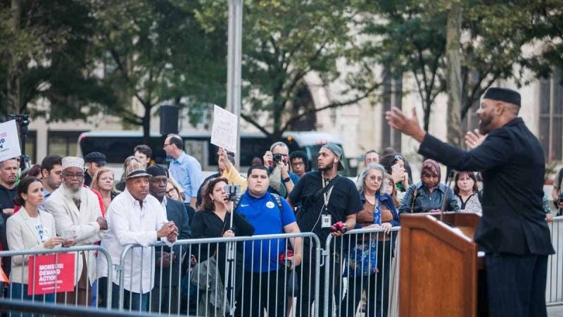 Area residents gather Tuesday evening for a vigil honoring the victims of the mass shooting at the Route 91 Harvest Festival in Las Vegas Sunday night.