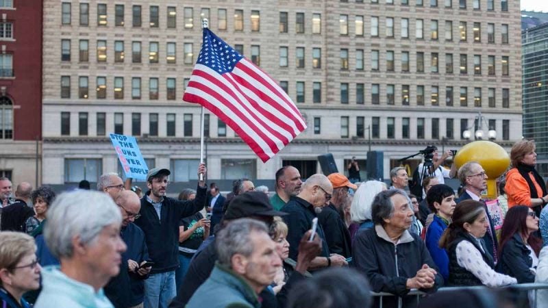 A Tuesday evening vigil in Philadelphia honors the victims of the mass shooting at the Route 91 Harvest Festival in Las Vegas Sunday night.