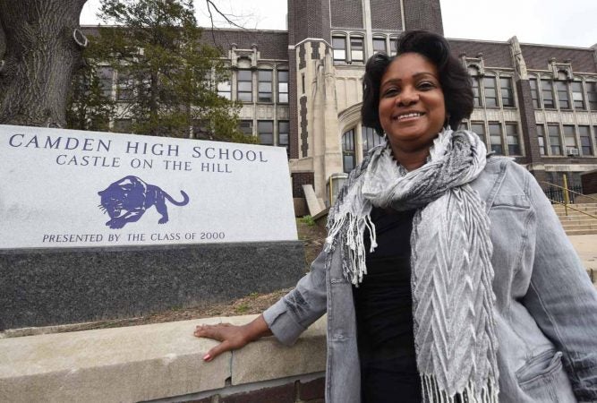 Camden High alum Dr. Doris Carpenter, who has led the fight to preserve the Castle, in front of the school in March 2017.  (April Saul/for Newsworks)