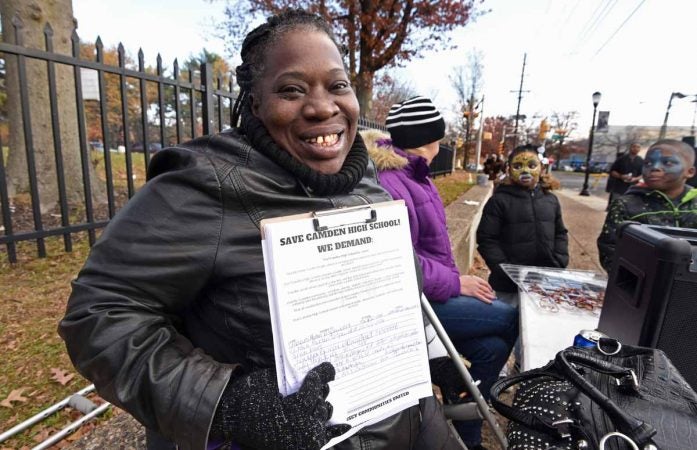 At a November 2016 block party to celebrate Camden High, education activist Vida Neil asked attendees to sign a petition to save the Castle. (April Saul/for Newsworks)