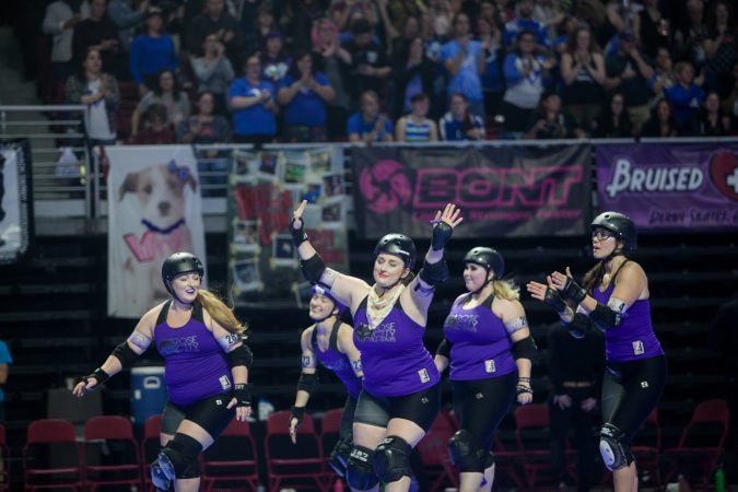 Defending champions, the Rose City Rollers of Portland, Oregon, skate before the final championship game against the Victorian Roller Derby League from Melbourne, Australia