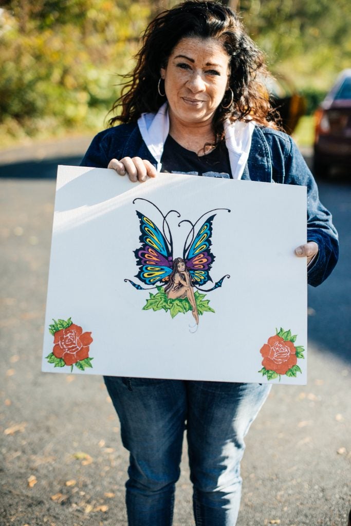 A colorful painting of a fairy with foliage is one of two pieces that Redina created while at the Roxbury Treatment Center.