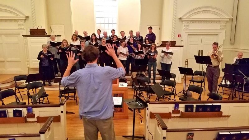 Art director Daniel Spatham conducts the Chestnut Hill Presbyterian Church choir