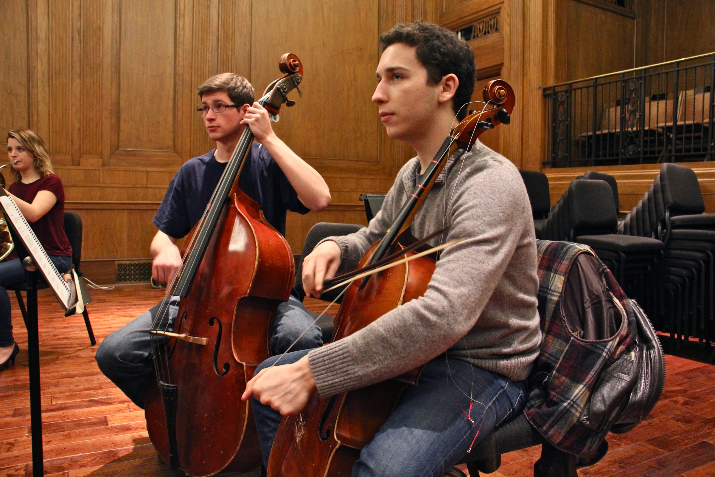 Curtis Institute of Music students William Karns (left) and Oliver Herbert rehearse "Symphony for a Broken Orchestra" at the school's Field Concert Hall.