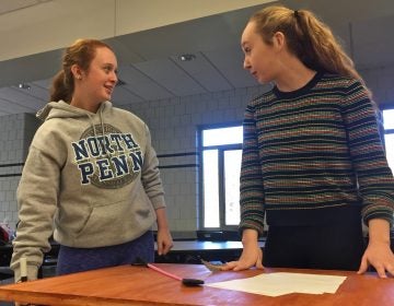 Grace Lewis (left) portrays Stephen Hopkins and Maura Slater (right) portrays John Hancock during a rehearsal for North Penn High School's production of 