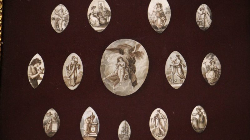 Ivory portrait slivers used in mourning jewelry depict various sentiments in this collection from the late 18th or early 19th century.