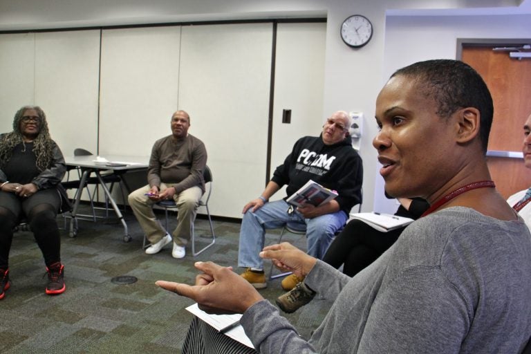 La Rhonda Harmon (right), a psychology intern at the Philadelphia College of Osteopathic Medicine, helps to lead a class called 