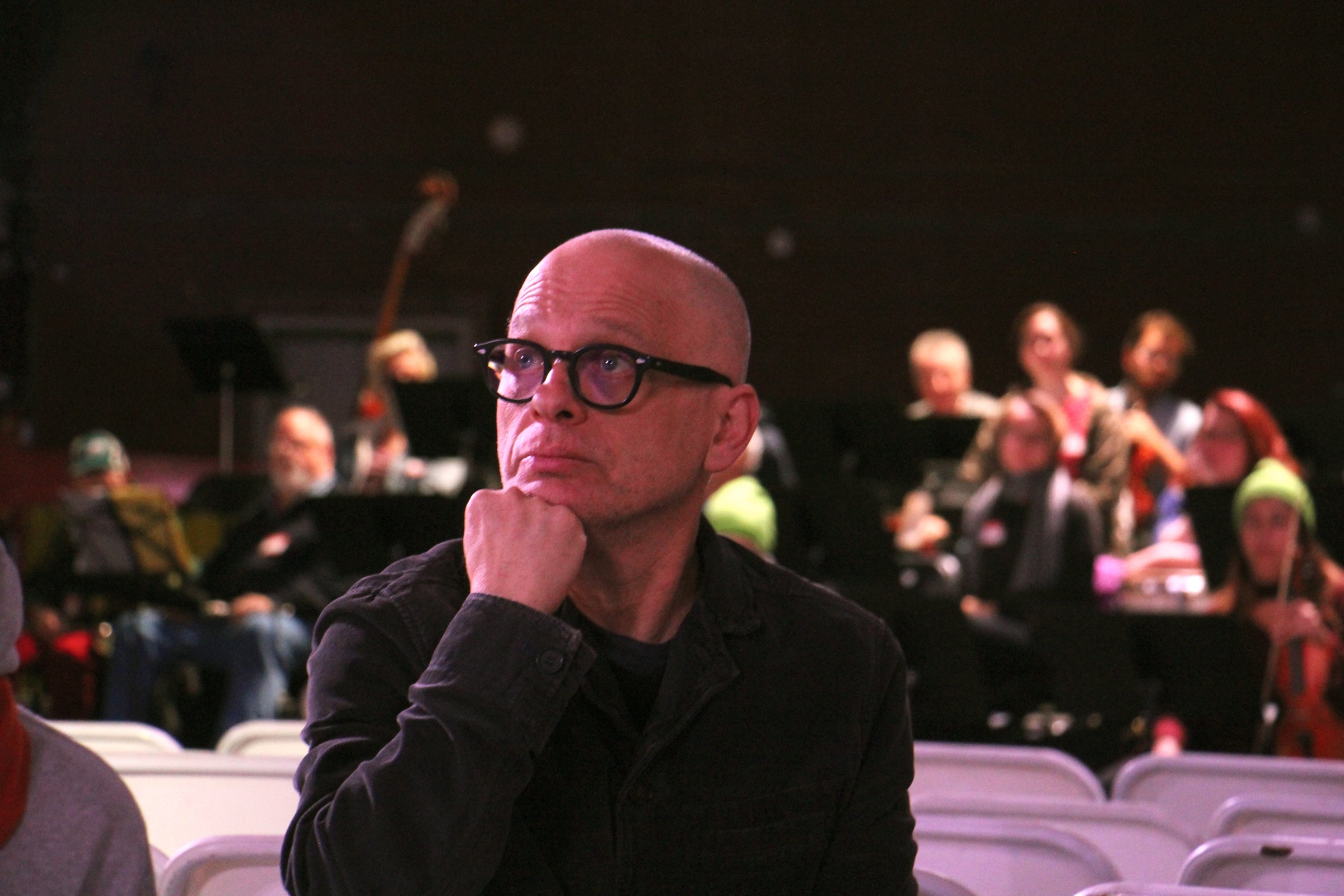 "Symphony for a Broken Orchestra" composer David Lang sits in on a rehearsal at the Armory.