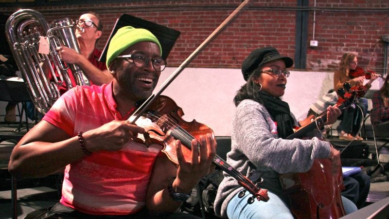 Owen Valentine, leader of the Philadelphia ensemble Urban Classique and group member Ginger Smith rehearse 