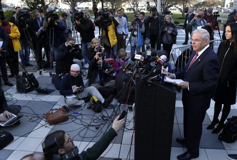 Democratic Sen. Bob Menendez speaks to reporters in front of the courthouse in Newark, N.J., Thursday, Nov. 16, 2017. The federal bribery trial of Menendez ended in a mistrial Thursday when the jury said it was hopelessly deadlocked on all charges against the New Jersey politician and a wealthy donor.