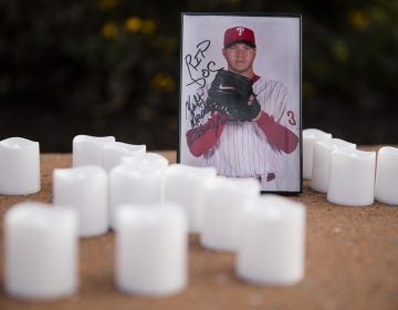 A memento is set in remembrance of former Phillies pitcher Roy Halladay outside Citizens Bank Park in Philadelphia, Wednesday, Nov. 8, 2017. Halladay, a two-time Cy Young Award winner who pitched a perfect game and a playoff no-hitter for the Phillies, died when his private plane crashed into the Gulf of Mexico. He was 40. (Matt Rourke/AP Photo)