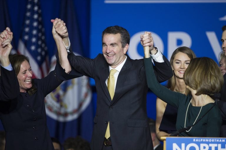 Virginia Gov.-elect Ralph Northam celebrates his election victory with his wife Pam and daughter Aubrey, right, and Dorothy McAuliffe, wife of Virginia Gov. Terry McAuliffe at the Northam For Governor election night party at George Mason University in Fairfax, Va., Tuesday, Nov. 7, 2017. (Cliff Owen/AP Photo)