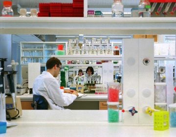 Workers in an AstraZeneca Pharmaceuticals Research lab in Boston. (photo courtesy AstraZeneca)