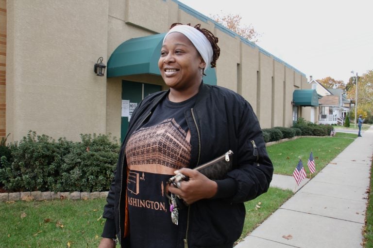 Paulsboro resident Christa Cooper leaves her polling place at the Paulsboro Fire House satisfied with her decision to vote for Phil Murphy for governor. (Emma Lee/WHYY)