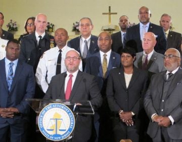 Joined by law enforcement and community leaders , New Jersey Attorney General Christopher Porrino announces the 