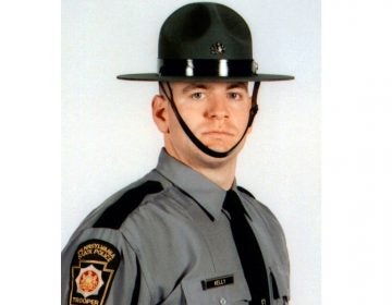 In this undated photo released by the Pennsylvania State Police, Cpl. Seth J. Kelly, is shown. Authorities have identified a Kelly as the Pennsylvania State Police trooper who was shot several times Tuesday, Nov. 7, 2017, during a traffic stop and remains hospitalized in critical condition. (Pennsylvania State Police via AP Photo)