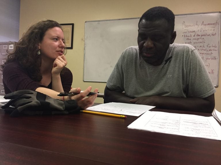 Sandie Knuth with student Joel Newton (Avi Wolfman-Arent/WHYY)