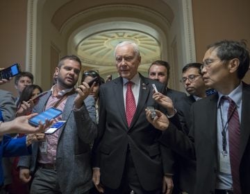 Senate Finance Committee Chairman Orrin Hatch, R-Utah, surrounded by reporters in the U.S. Capitol. The committee will hold its hearing on its tax bill next week. Senators aim to pass it out of committee before the Thanksgiving holiday.
(J. Scott Applewhite/AP)
