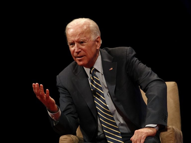 Former Vice President Joe Biden participates in a discussion on bridging political and partisan divides with Ohio Gov. John Kasich at the University of Delaware in Newark, Del., last month.