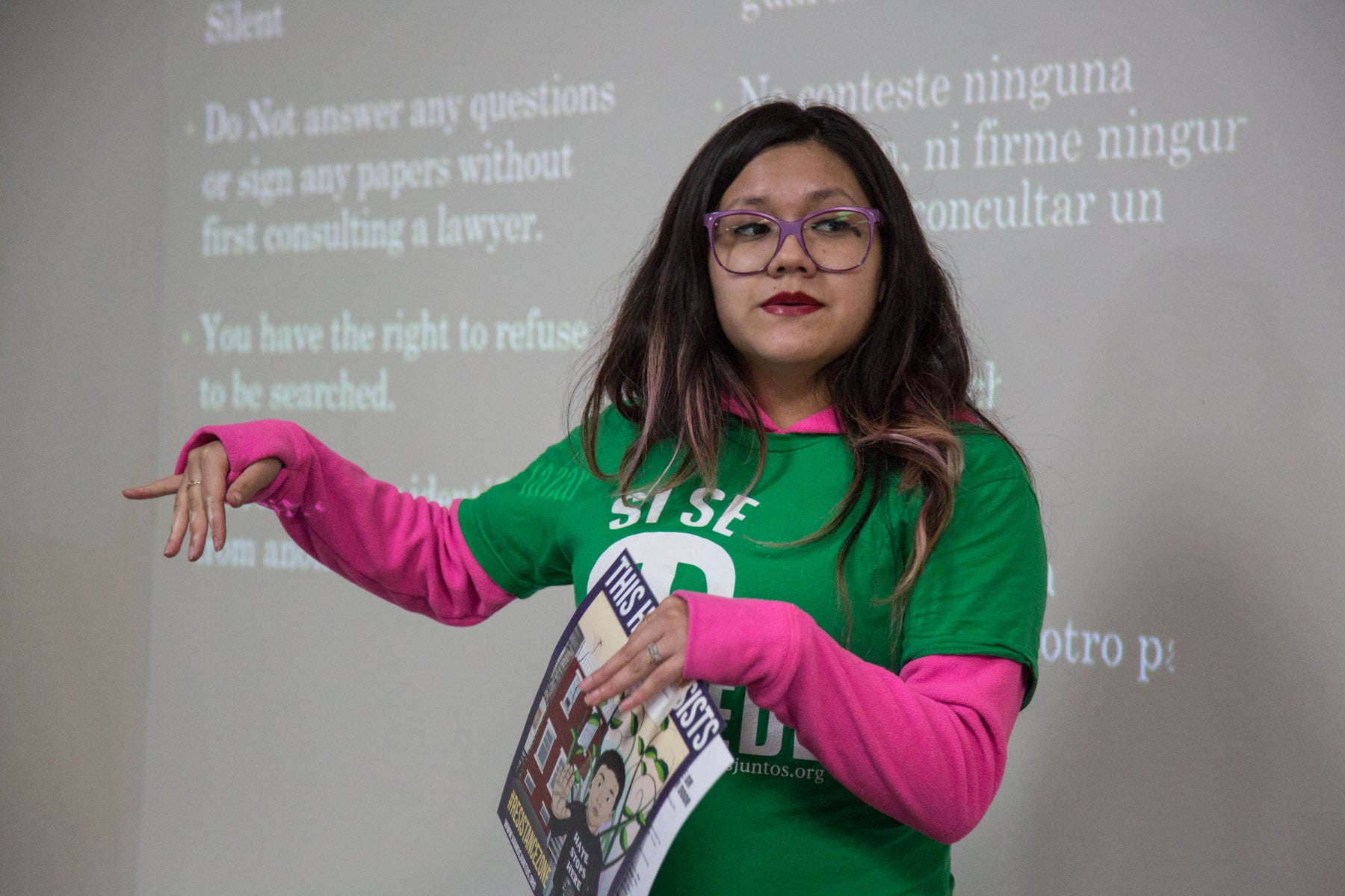 Olivia Vazquez, the community organizer for Juntos, teaches participants about their rights when ICE comes to their home.