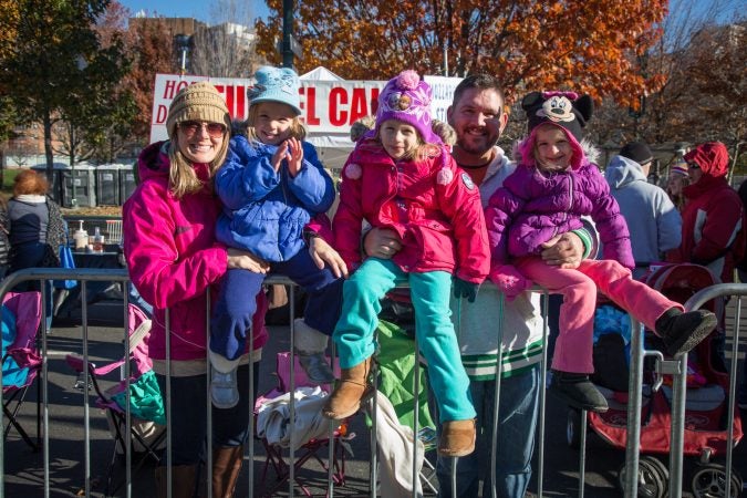 The Hastings family enjoys the 98th annual Philadelphia Thanksgiving Day Parade, November 23, 2017. (Emily Cohen for WHYY)