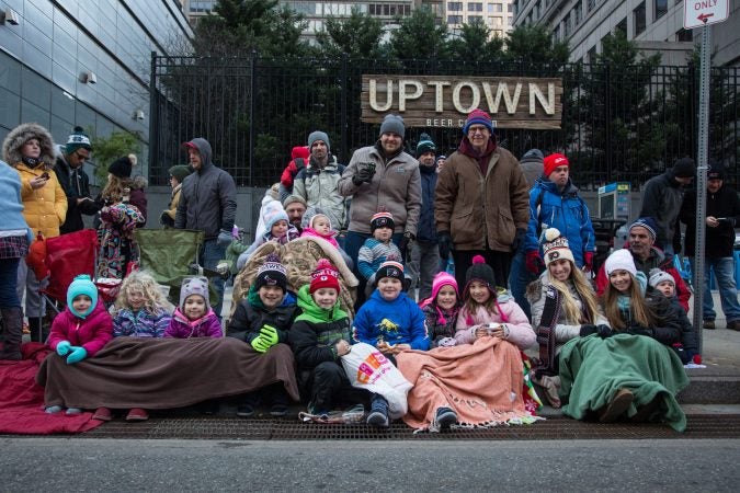 The Radetich-Coluter family has been coming to the annual Thanksgiving day Parade in Philadelphia for 35 years. (Emily Cohen for WHYY)