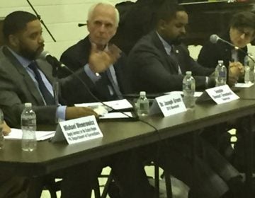 Stewart Greenleaf (third from left) and Sharif Street (fourth from left) held the second of three judiciary hearings on criminal justice reform at Deliverance Evangelistic Church in North Philadelphia. (Annette John-Hall, WHYY)