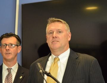 Acting U.S. Attorney William Fitzpatrick (right) and FBI Special Agent in Charge Timothy Gallagher outline charges against former Bordentown Township Police Chief Frank Nucera. (Tom MacDonald, WHYY)