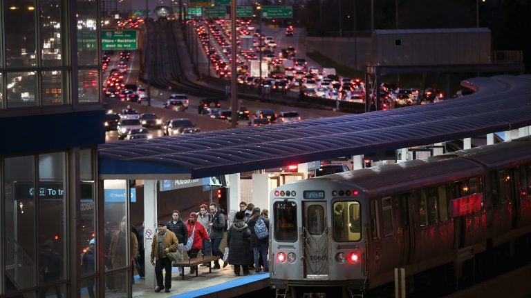 

Hopefully these Chicago travelers had plenty to keep them entertained Tuesday evening. That looks like it might have taken a while. (Scott Olson/Getty Images) 